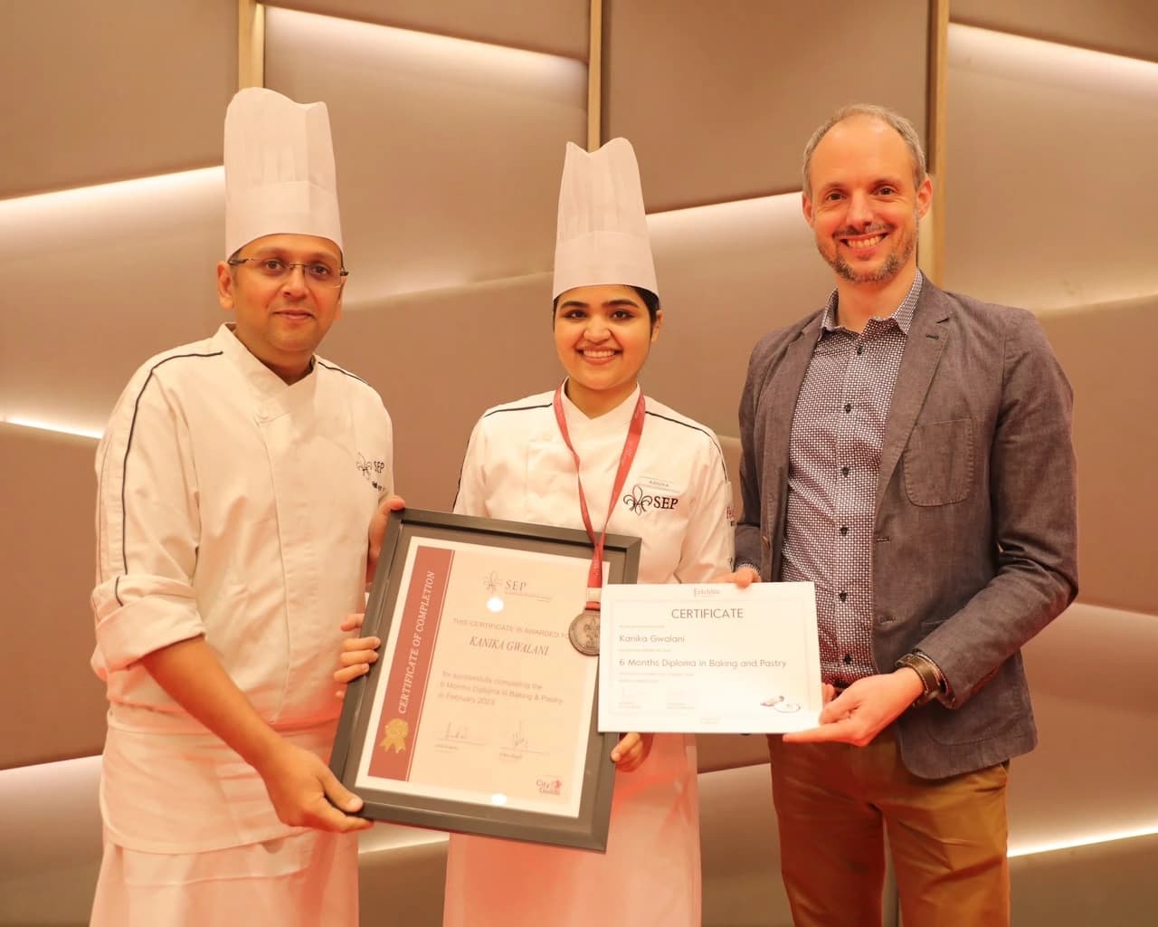 Kanika receiving her diploma at the School of European Pastry, Mumbai